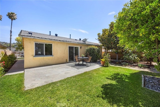 4161 E Fauna Ave, Anaheim, CA 92807 - back of house with stucco siding and a patio