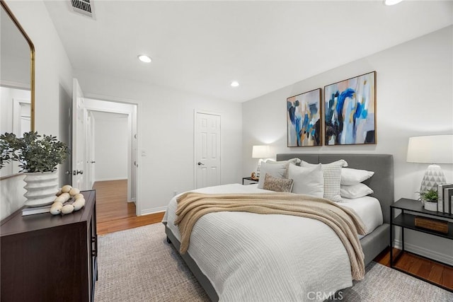 4161 E Fauna Ave, Anaheim, CA 92807 - bedroom featuring wood finished floors and recessed lighting