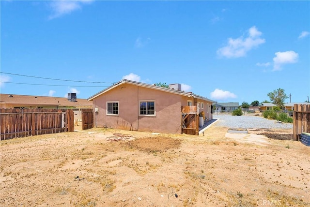21815 Jelan Ave, Apple Valley, CA 92307 - rear view of house with stucco siding