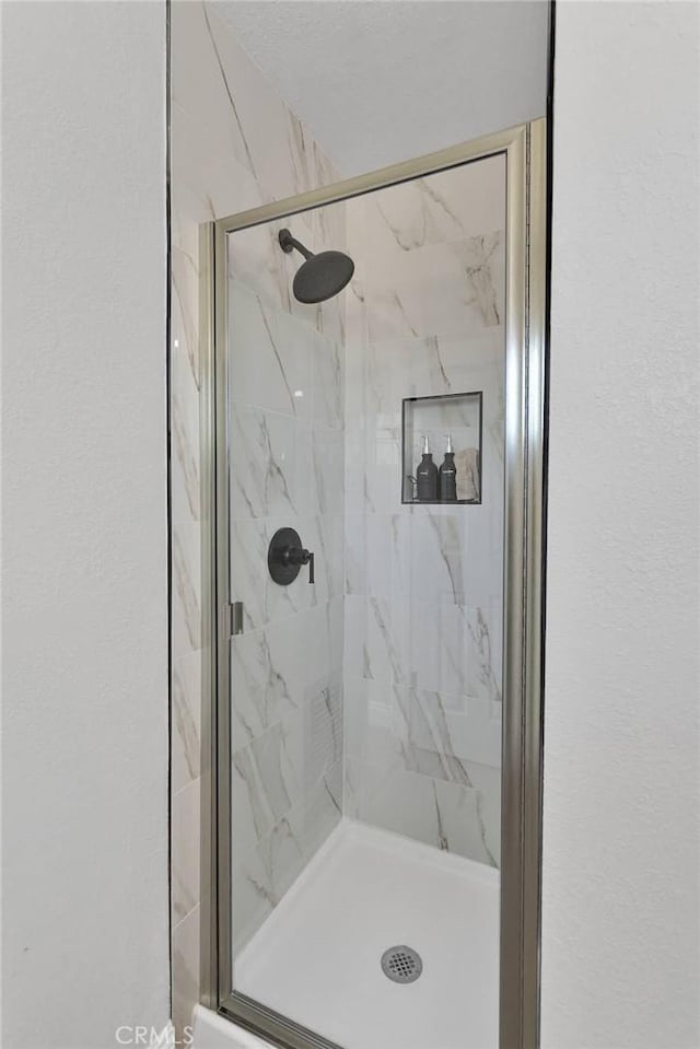 21815 Jelan Ave, Apple Valley, CA 92307 - bathroom with a marble finish shower