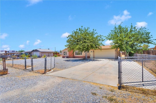 21815 Jelan Ave, Apple Valley, CA 92307 - view of front of property featuring a gate, driveway, and a garage