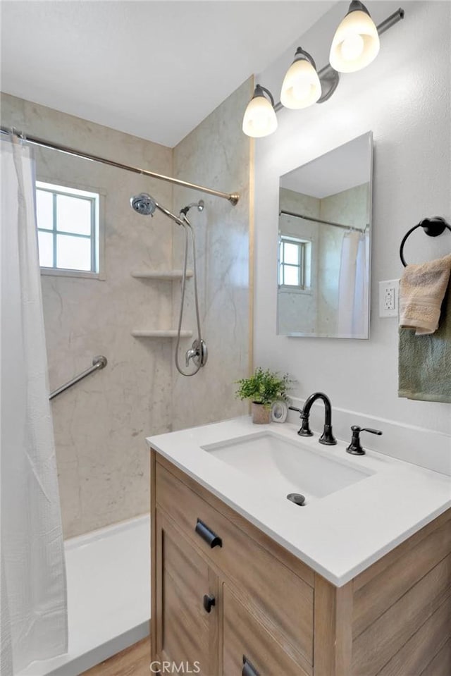 21815 Jelan Ave, Apple Valley, CA 92307 - bathroom with vanity, shower / bath combination with curtain, and healthy amount of natural light