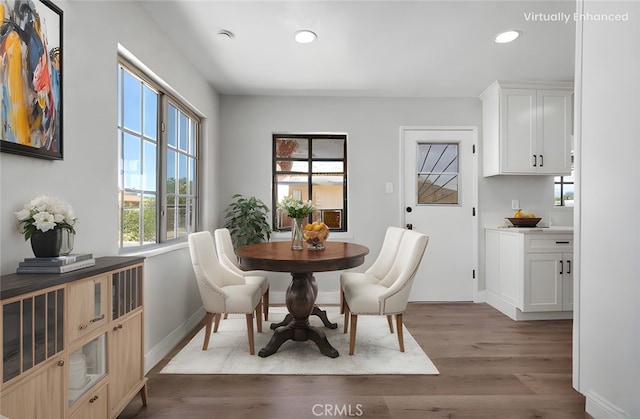 21815 Jelan Ave, Apple Valley, CA 92307 - dining area featuring healthy amount of natural light, recessed lighting, and wood finished floors