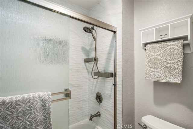 24343 Landover Rd Unit 139, Laguna Hills, CA 92653 - full bathroom featuring toilet and shower / bath combination with glass door