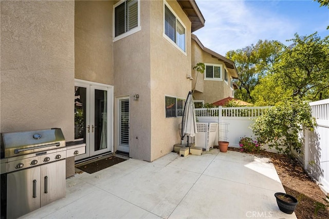 24343 Landover Rd Unit 139, Laguna Hills, CA 92653 - fenced backyard with french doors and a patio area
