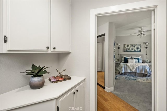24343 Landover Rd Unit 139, Laguna Hills, CA 92653 - bar with light wood finished floors and a ceiling fan