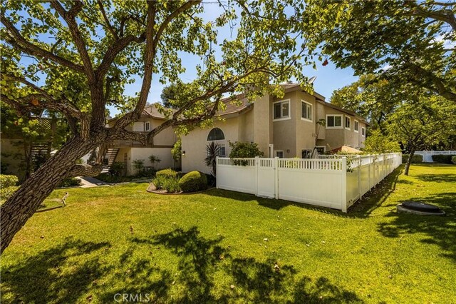 24343 Landover Rd Unit 139, Laguna Hills, CA 92653 - back of house featuring stucco siding