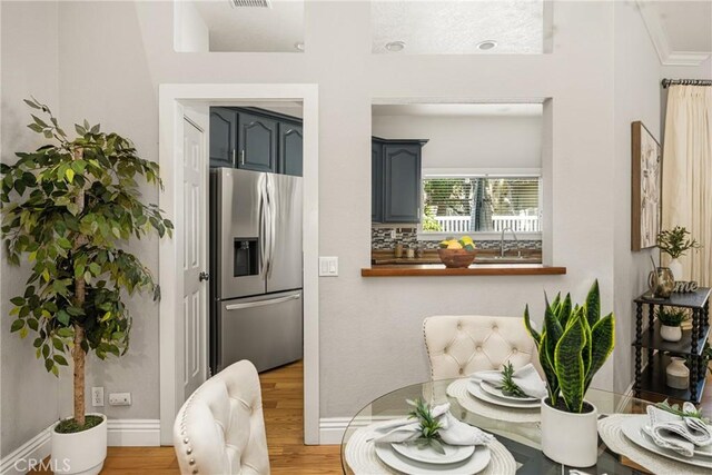 24343 Landover Rd Unit 139, Laguna Hills, CA 92653 - dining room featuring wood finished floors and baseboards