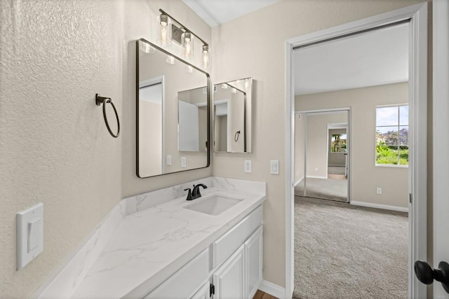 4625 Los Alamos Way Unit C, Oceanside, CA 92057 - bathroom featuring vanity and baseboards