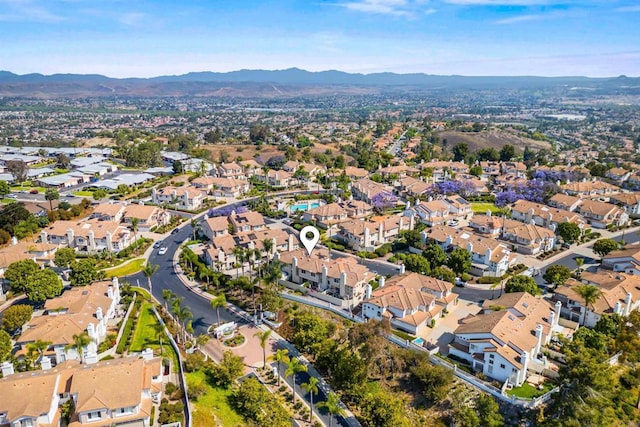 4625 Los Alamos Way Unit C, Oceanside, CA 92057 - aerial overview of property's location with a mountainous background and nearby suburban area