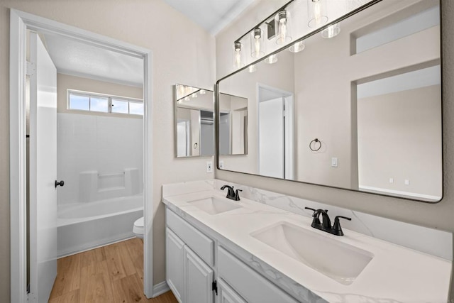 4625 Los Alamos Way Unit C, Oceanside, CA 92057 - full bathroom with double vanity, wood finished floors, and bathing tub / shower combination