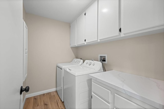 4625 Los Alamos Way Unit C, Oceanside, CA 92057 - washroom featuring cabinet space, separate washer and dryer, and light wood-style floors