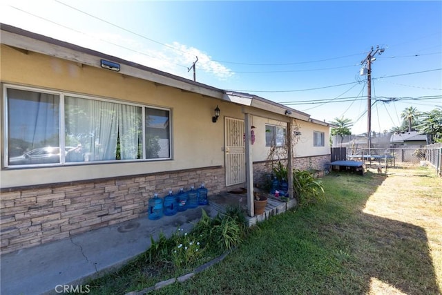 5082 La Madera Ave, El Monte, CA 91732 - view of front of home with a trampoline and stucco siding