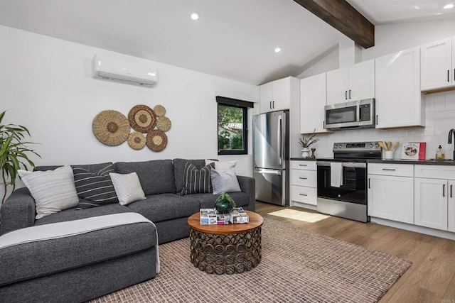 602 Sereno View Rd, Encinitas, CA 92024 - living room featuring a wall mounted air conditioner, wood finished floors, and recessed lighting