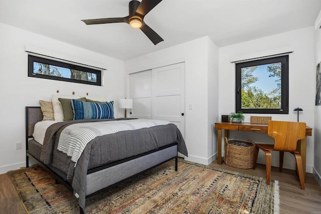 602 Sereno View Rd, Encinitas, CA 92024 - bedroom featuring wood finished floors, a closet, and a ceiling fan