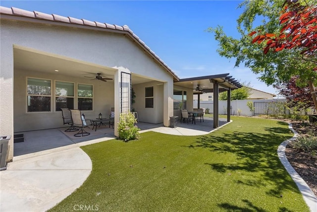 14217 Pemberley Passage Ave, Bakersfield, CA 93311 - rear view of house with a ceiling fan, stucco siding, and a patio