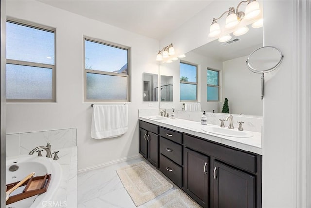 14217 Pemberley Passage Ave, Bakersfield, CA 93311 - full bathroom with marble look tiles, double vanity, and a bath