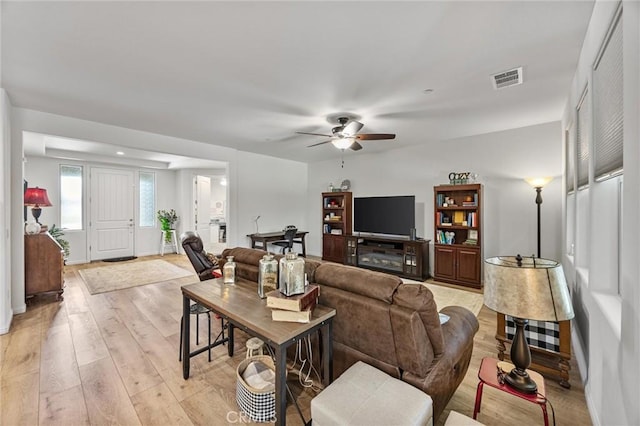 14217 Pemberley Passage Ave, Bakersfield, CA 93311 - living room featuring a ceiling fan and light wood finished floors