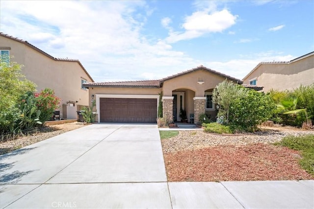 26947 Mountaingate St, Menifee, CA 92585 - mediterranean / spanish house with an attached garage, stucco siding, stone siding, a tiled roof, and driveway