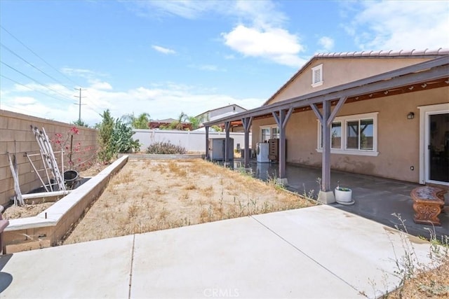 26947 Mountaingate St, Menifee, CA 92585 - fenced backyard with a patio area
