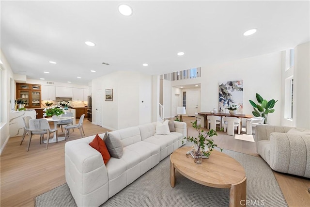 15 Lyon Rdg, Aliso Viejo, CA 92656 - living room featuring light wood-style flooring and recessed lighting