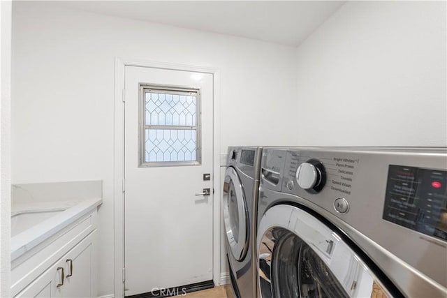 15 Lyon Rdg, Aliso Viejo, CA 92656 - laundry room featuring washing machine and dryer and cabinet space
