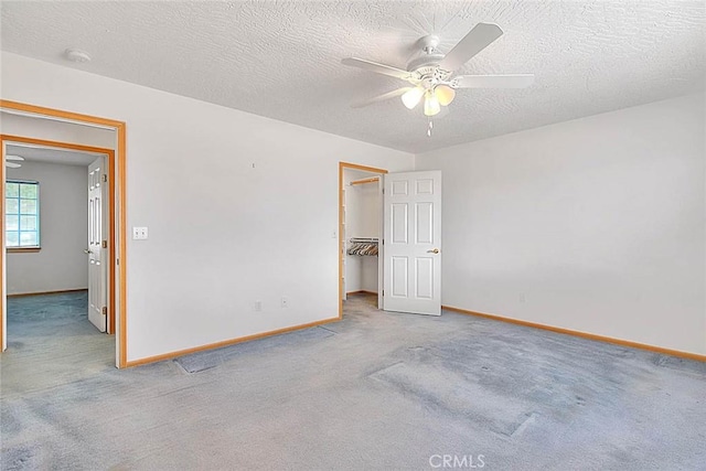 14158 Tu Su Cir, Apple Valley, CA 92307 - unfurnished room with a ceiling fan, carpet floors, a smoke detector, and a textured ceiling