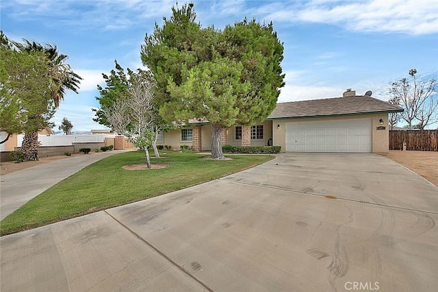 14158 Tu Su Cir, Apple Valley, CA 92307 - view of front facade with driveway, an attached garage, and stucco siding
