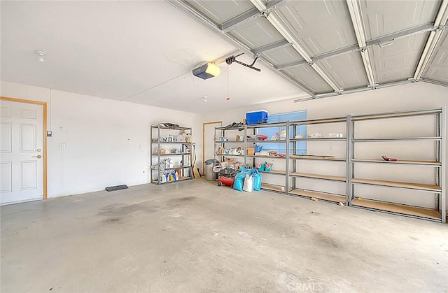 14158 Tu Su Cir, Apple Valley, CA 92307 - garage featuring a garage door opener