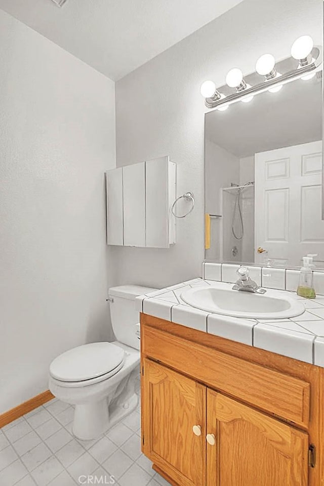 14158 Tu Su Cir, Apple Valley, CA 92307 - full bathroom with vanity, tile patterned floors, and a shower