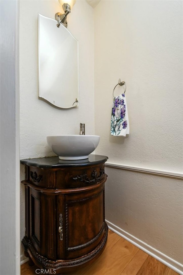 19536 Kittridge St, Reseda, CA 91335 - bathroom featuring vanity and wood finished floors