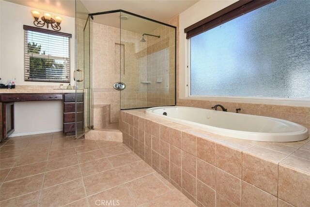 19536 Kittridge St, Reseda, CA 91335 - full bath featuring a bath, a stall shower, and tile patterned flooring