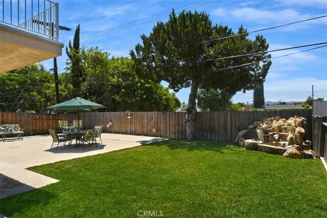 19536 Kittridge St, Reseda, CA 91335 - fenced backyard with a patio and a balcony