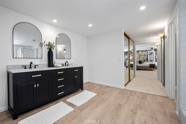 26532 Via Marina, Mission Viejo, CA 92691 - bathroom featuring ensuite bath, double vanity, wood finished floors, and recessed lighting