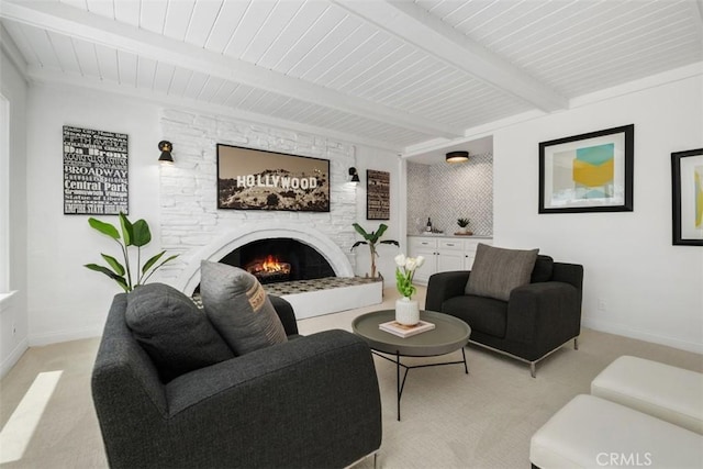 26532 Via Marina, Mission Viejo, CA 92691 - living area with light colored carpet, a fireplace, and a wood ceiling with exposed beams