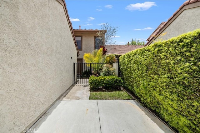 8396 Goldsport Cir, Huntington Beach, CA 92646 - view of patio featuring a gate
