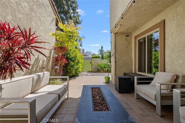 8396 Goldsport Cir, Huntington Beach, CA 92646 - view of patio / terrace with outdoor lounge area and a gate