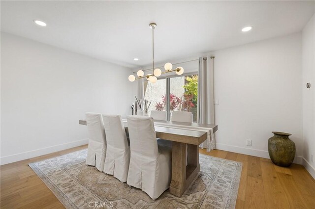 8396 Goldsport Cir, Huntington Beach, CA 92646 - dining room with recessed lighting and light wood-style flooring
