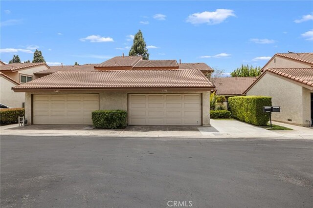 8396 Goldsport Cir, Huntington Beach, CA 92646 - view of front of property with stucco siding and a tile roof