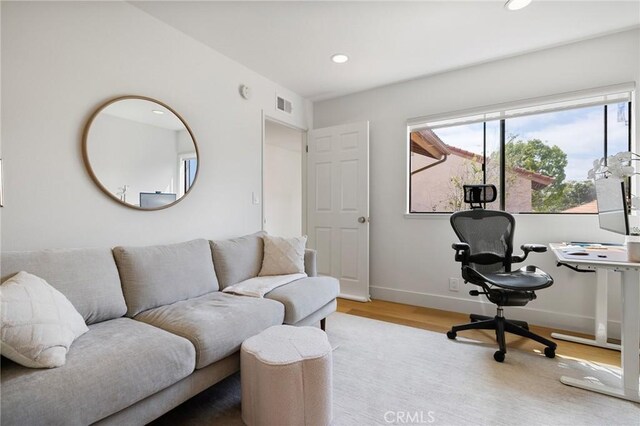 8396 Goldsport Cir, Huntington Beach, CA 92646 - office area featuring wood finished floors and recessed lighting