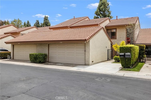 8396 Goldsport Cir, Huntington Beach, CA 92646 - view of front facade with stucco siding and a tile roof