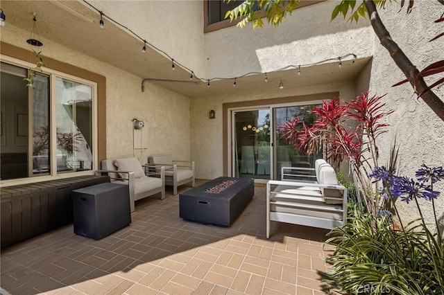 8396 Goldsport Cir, Huntington Beach, CA 92646 - view of patio / terrace with an outdoor living space with a fire pit
