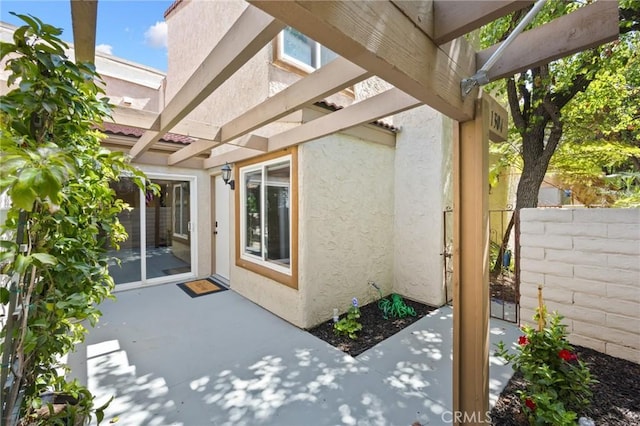 1304 Calle Grande Unit 68, Fullerton, CA 92835 - view of patio with a pergola