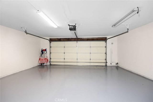 1304 Calle Grande Unit 68, Fullerton, CA 92835 - garage with a garage door opener