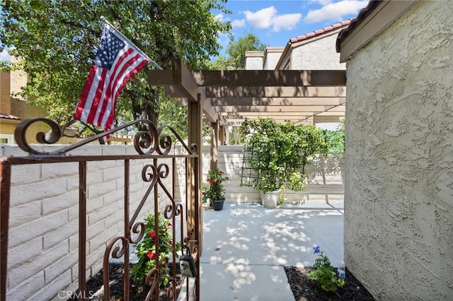1304 Calle Grande Unit 68, Fullerton, CA 92835 - gate with a pergola and a patio