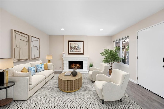 1304 Calle Grande Unit 68, Fullerton, CA 92835 - living area featuring wood finished floors, recessed lighting, and a fireplace