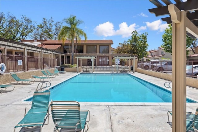 1304 Calle Grande Unit 68, Fullerton, CA 92835 - community pool with a patio area and a pergola