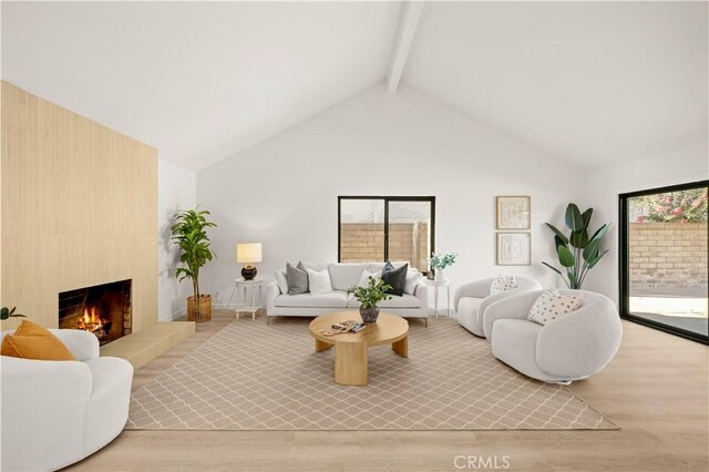 4700 Emerald Ave, La Verne, CA 91750 - living area with wood finished floors and a fireplace