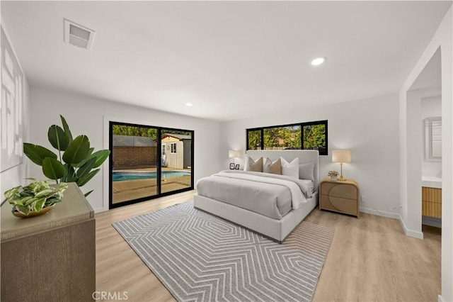4700 Emerald Ave, La Verne, CA 91750 - bedroom with access to exterior, multiple windows, light wood finished floors, and recessed lighting