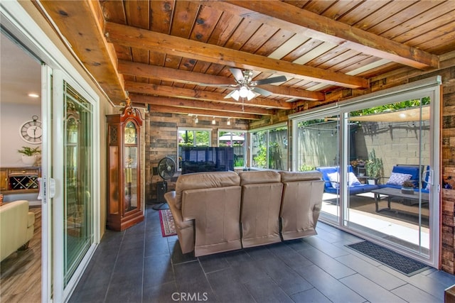 9099 Via Vista Dr, Buena Park, CA 90620 - sunroom / solarium with outdoor lounge area, ceiling fan, and beam ceiling